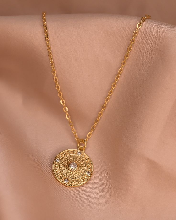 The Sianna necklace is a stunning circle shaped necklace that shines brightly with any outfit. The simplistic beauty of the pendant on the bold chain makes it the perfect piece to wear from work to a night out, or layered with other Stavi Sol necklaces! Chain 24K Gold Filled Rolo Chain Length: 20” inches Charms: 24K Gold Filled 15mm x 15mm Necklaces Chain, Circle Shape, Rolo Chain, Chain Lengths, Chain Length, Gold Filled, Night Out, Gold Necklace, Charms