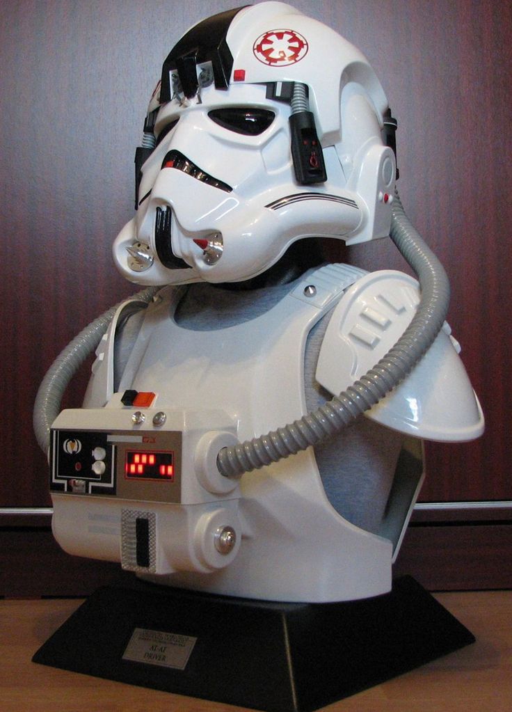 a star wars helmet on display in a room