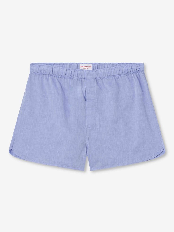 Our modern fit boxers feature a streamlined shape for a flattering design that remains comfortable. An elasticated waistband, curved leg seams and side vents ensure longevity and practicality, whilst our self-seeking magnetic fly closure is a hidden blessing. This simple but revolutionary feature allows easy opening and hassle-free closure of the fly. These boxers are made from our signature cotton batiste fabric with a soft finish and a plain, open weave that is designed to be ultra-smooth on t Sporty Blue Boxer Briefs With Elastic Waistband, Blue Stretch Boxer Briefs With Elastic Waistband, Stretch Blue Boxer Briefs With Elastic Waistband, Blue Boxer Briefs For Loungewear, Cotton Boxer Briefs For Summer, Solid Cotton Boxer Briefs For Summer, Summer Solid Color Cotton Boxer Briefs, Blue Boxer Briefs With Elastic Waistband For Loungewear, Summer Relaxed Fit Boxer Briefs For Daywear