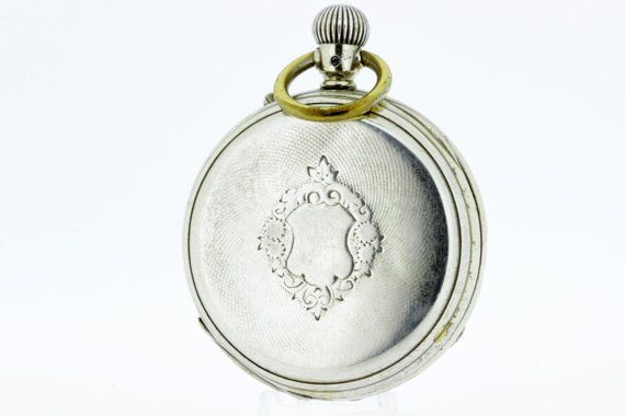 Longines Pocket Watch Plated Timeless Engraved Compact Pocket Watch, Vintage Silver Watches With Compass Design, Antique Silver Watch With Round Dial, Antique Engraved Silver Pocket Watch, Silver Locket Watch For Formal Occasions, Timeless Engraved Silver Watch Accessories, Antique Silver Pocket Watch With Compass Design, Luxury Silver Pocket Watch, Colored Leather