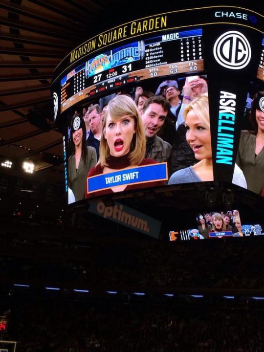 the big screen at madison square garden is showing taylor swift and taylor swift