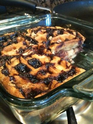 a close up of a casserole in a glass dish on a stove top