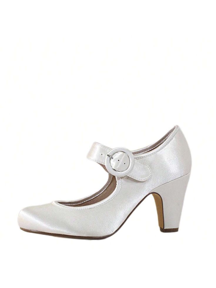 Calling all brides! These satin Mary Jane bridal heels were made for perfection. You'll definitely feel like a vintage  bride in these beauties.

Upper: Satin
Leather lining
Buckle closure
Heel Height: 3"
Madeline Satin Mary Janes IVORY     Plain    Women Shoes, size features are:Bust: ,Length: ,Sleeve Length: Bridal Heels, Vintage Bride, Women's Pumps, Mary Janes, All Fashion, Length Sleeve, Heel Height, Latest Trends, Buckle