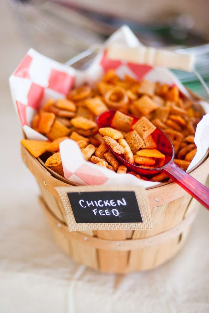 a wooden basket filled with cheeto fries on top of a table