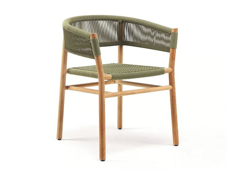 a wooden chair with a green seat and backrest on a white background in front of a white backdrop