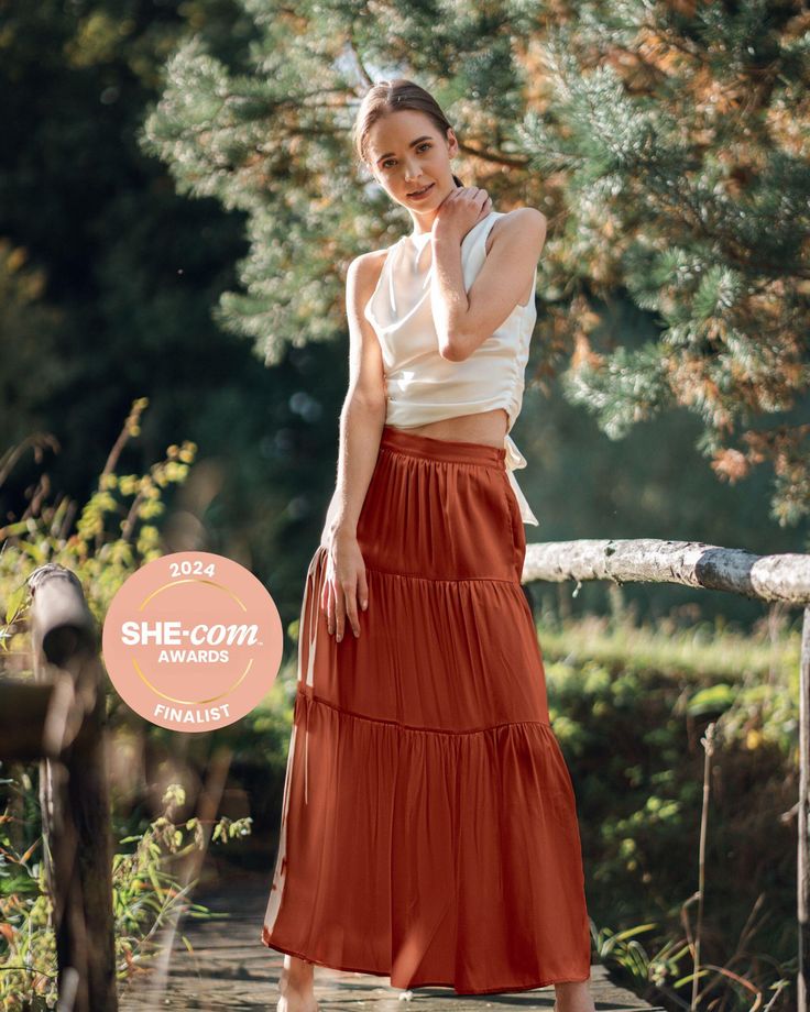 Our exquisite Pure Silk Tiered Maxi Skirt in Burnt Orange / Rust is one of my favourite pieces. Designed by me in Europe and crafted with utmost care by our fine silk artisans, this skirt is elegant, sophisticated and on trend with the gorgeous rust colour that is THE colour of the season. Made from 16 momme silk which has the most luxurious feel, this skirt offers a floaty drape that gracefully flows as you move. The sandwashed finish adds a subtle sheen and a suede-like softness to the fabric. Orange Maxi Skirt, Rust Colour, Skirt Flowy, Evening Cocktail Party, Skirts Flowy, Long Skirt Summer, Silk Maxi Skirt, Silk Gifts, Orange Skirt