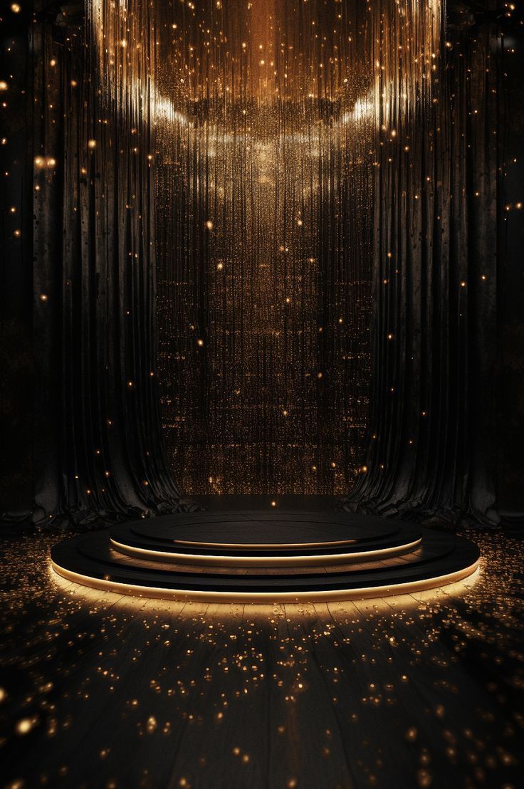 an empty stage with gold lights and curtains