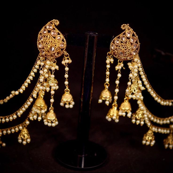 Bahu-Bali Earrings Trending Long Droplet Kundan Jhumkey With Multilayer Saharay Traditional Pearl Earrings With Dangling Beads For Party, Party Temple Jewelry Earrings With Dangling Beads, Tilla Chandelier Earrings For Party, Traditional Bridal Earrings With Dangling Beads, Traditional Bridal Earrings With Dangling Beads For Party, Party Chandelier Earrings With Beaded Details, Adjustable Festive Earrings For Celebration, Gold Tilla Earrings For Party, Party Tilla Dangle Jhumkas