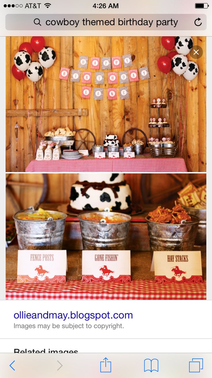 the dessert table is decorated with red and white balloons, cow - print napkins, and paper plates