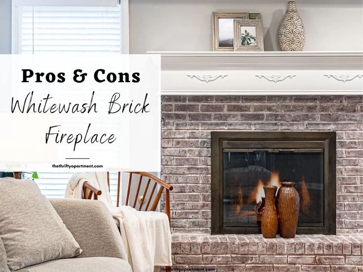 a living room with a fire place next to a couch and chair in front of a brick fireplace