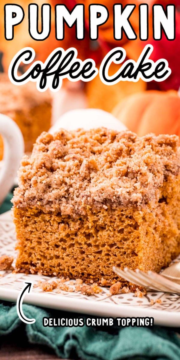 a close up of a piece of pumpkin coffee cake on a plate with a fork