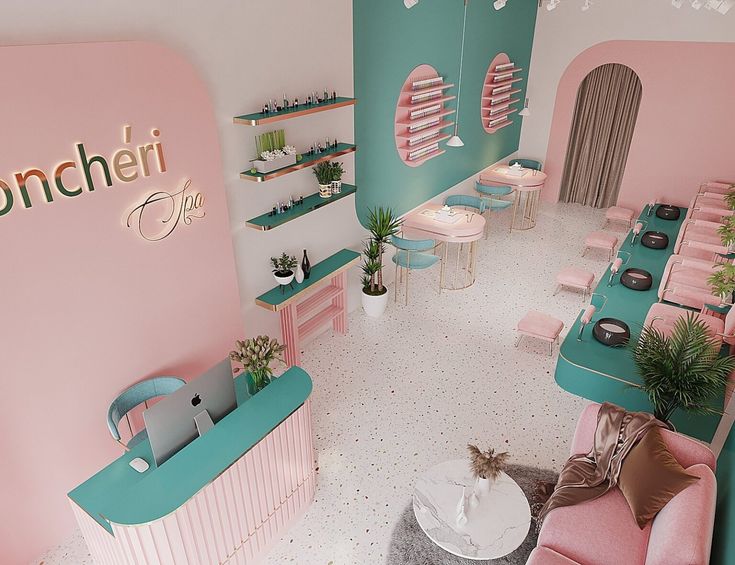 the interior of a pink and teal restaurant