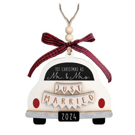 a christmas ornament hanging from the side of a car