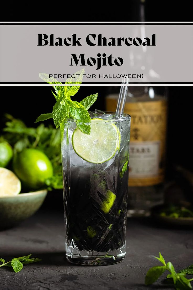 black charcoal mojito with lime and mint garnish