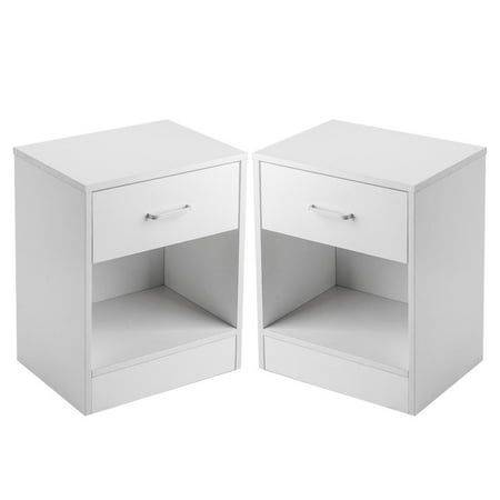 two white nightstands side by side with one open drawer and the other closed door