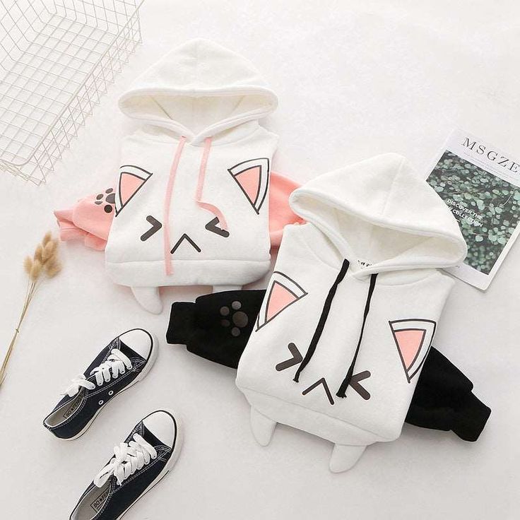 Be the Cat's Meow with Our Adorable Anime Cat Hoodie Meow-wow! Looking for a cute and playful way to show off your love for all things feline? Look no further than our Kawaii Japanese Cat Hoodie! With its sweet cat face on the front and paw prints on the bottom, you'll be the most kawaii kitty in town 🥰 Stay Cozy and Cute All Year Long Our hoodie isn't just stylish - it's practical, too! Made from a premium blend of cotton and polyester, it feels soft and smooth against your skin, making it the White Kawaii Hoodie With Cartoon Print, Cute Long Sleeve Sweatshirt With Cat Design, Cute Cat Print Hooded Hoodie, Cute Long Sleeve Hoodie With Cat Design, Kawaii Long Sleeve Hoodie With Cat Design, Playful White Hoodie Sweatshirt, Cute Cotton Sweatshirt With Cat Design, Cute Cat Design Tops For Winter, Cute Cat Design Top For Winter