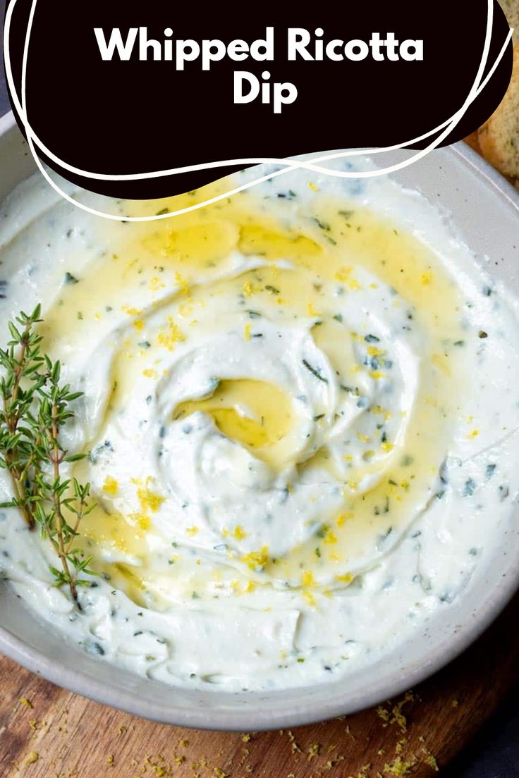 a white bowl filled with whipped ricotta dip