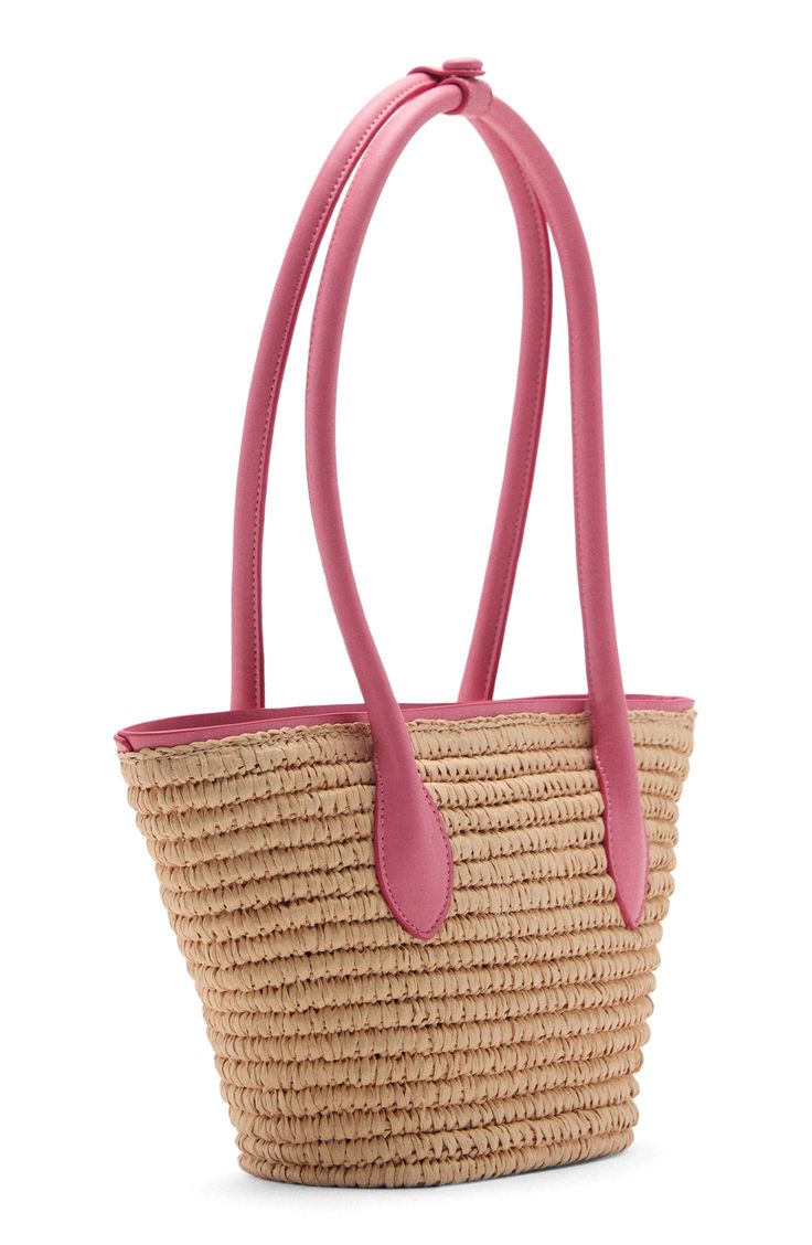 A tote carries all your sunny-day essentials securely thanks to a magnetic-snap closure. Magnetic-snap closure Shoulder straps Paper/polyurethane Imported Spring Straw Bag With Leather Handles, Pink Straw Bag With Leather Handles For Summer, Casual Leather Straw Bag For The Beach, Summer Pink Straw Bag With Leather Handles, Spring Everyday Straw Bag With Adjustable Strap, Spring Straw Bag For Daily Use With Adjustable Strap, Spring Straw Bag With Adjustable Strap For Everyday Use, Spring Casual Straw Bag, Casual Spring Straw Bag