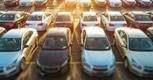 a parking lot filled with lots of parked cars