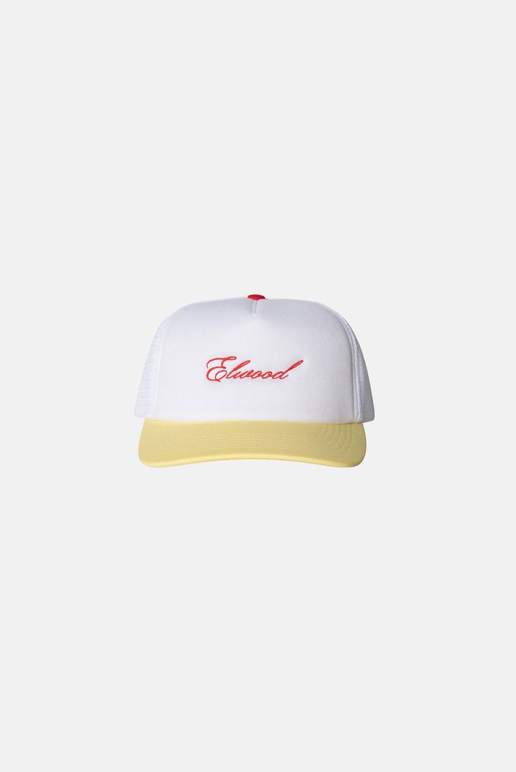 You can never have too many. The Script Trucker Cap has a high crown design with a snapback closure. The front features our Elwood logo in cursive. Available in Red/White, Yellow/White, and Blue/White. 70 DENIER INTERLOCK, 3 OZ FOAM FRONT WITH ELWOOD EMBROIDERY MESH TOP PLASTIC SNAP STRIP ADJUSTER White 5-panel Hip Hop Baseball Cap, Retro White Snapback Hat With Flat Brim, White Retro Snapback Trucker Hat, Yellow Curved Brim Baseball Cap For Streetwear, Yellow Snapback Hat With Curved Brim For Streetwear, White Retro Baseball Cap For Streetwear, Retro White Snapback Baseball Cap, Retro Yellow Trucker Hat With Curved Brim, Retro Yellow Curved Brim Trucker Hat