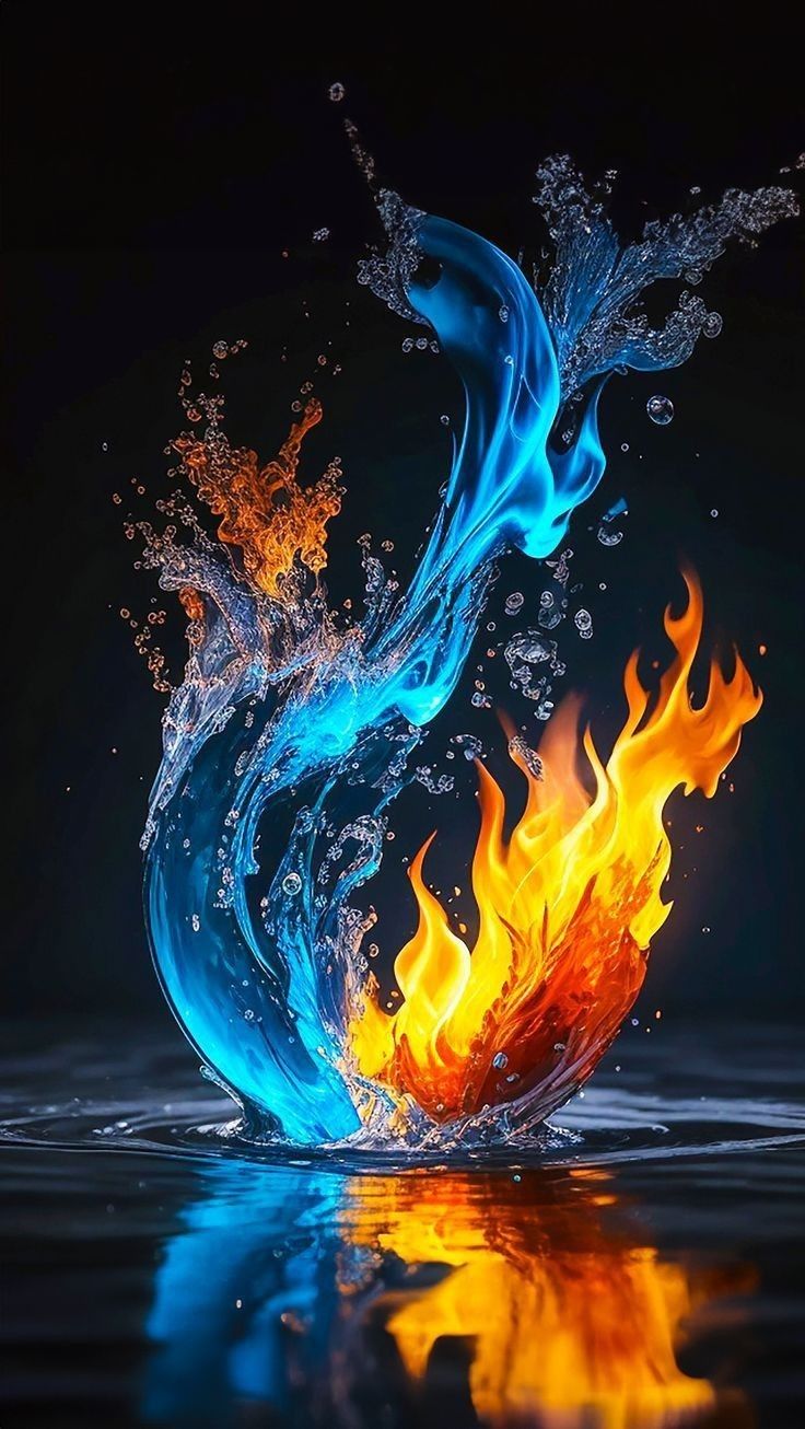 fire and water splashing into each other in the dark, with bright orange and blue colors