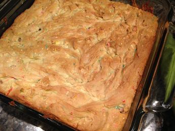 a cake in a pan with sprinkles on it