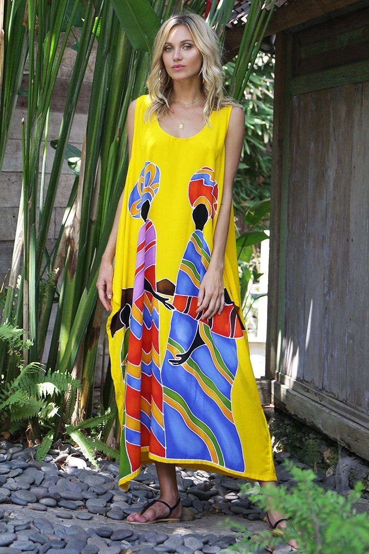 Well crafted and uniquely made, this sleeveless dress will not only make a statement but will give you long-lasting comfort all day long. Enjoy the hand-painted tribal design. Flowy and lightweight material top off this lounge dress. Take with you on vacation and use as a swimsuit coverup. Fits sizes petite to plus size. Sleeveless tank dress Hand-painted tribal designs Made from soft and lightweight rayon material Machine wash with like colors, hang to dry Sleeveless Printed Tropical Beach Dress, Tropical Sleeveless Printed Beach Dress, Bohemian Sleeveless Printed Dress For Beach Season, Yellow Sleeveless Summer Dress For Vacation, Yellow Sundress For Vacation, Casual Yellow Beach Dress, Sleeveless Printed Beach Dress For Beach Party, Tropical Sleeveless Sundress For Beach, Sleeveless Tropical Sundress For Beach