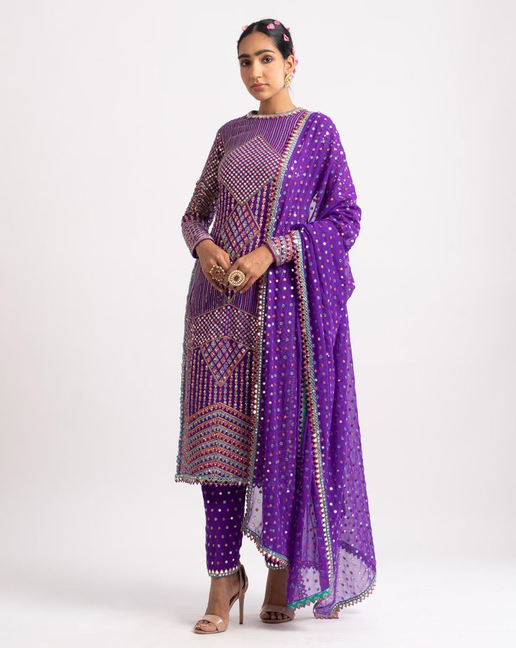 Intricately hand-embroidered multi-color kurta with fully embroidered pants and dupatta with mirror border.From Vvani Vats Rang's collection.DELIVERY TIMEPlease allow 8-12 weeks for your outfit to arrive.FABRIC DETAILSGeorgette, Silk BlendProfessional cleaning only. Vani Vats, Mirror Border, Border Fabric, Embroidered Pants, Purple Silk, Kurta Set, Cut Work, Aza Fashion, Color Purple