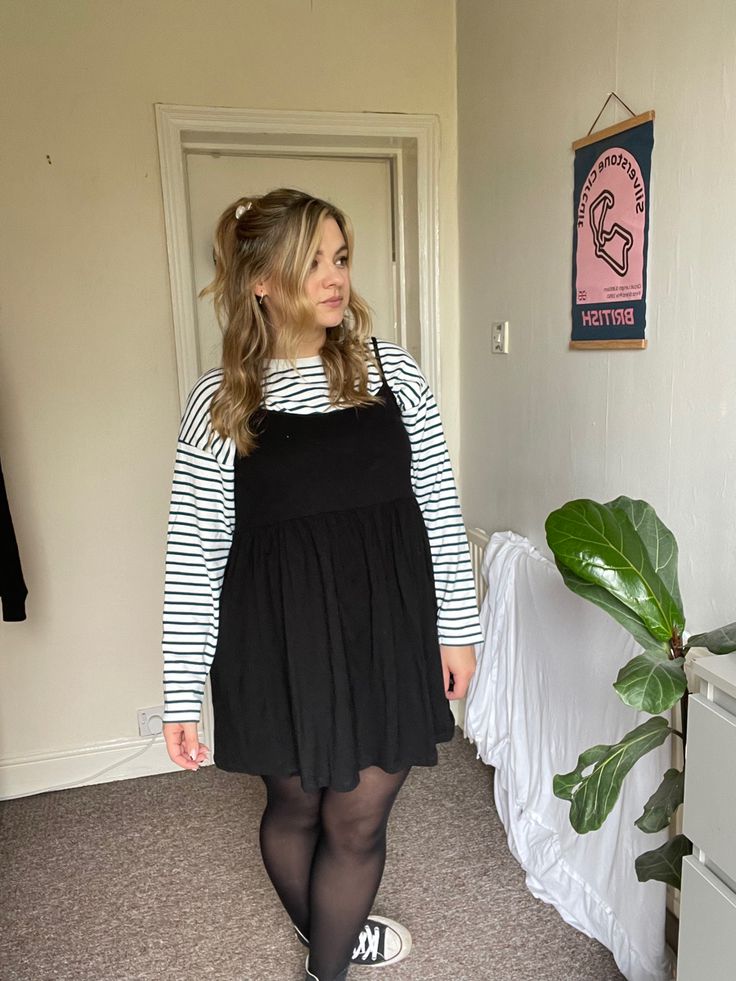 Layer a strappy dress over a long sleeve top. Sweater And Dress Layering Outfit Ideas, Fall Outfits For Large Bust, Black Dress Autumn Outfit, Sweater Under Dress Outfit, Modest Emo Outfits, Layered Dress Outfit Fall, Layering Dress Outfit, Curve Outfit Ideas, Maxi Dress Fall Outfit