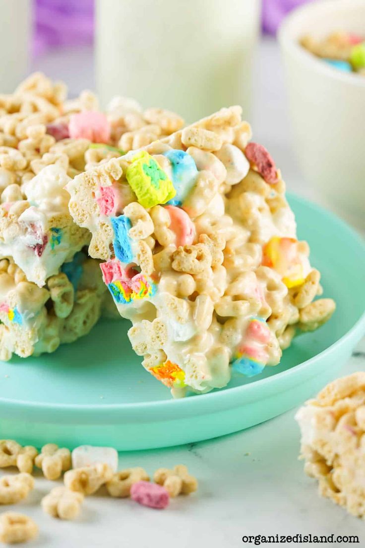 cereal krispy kreme treats are on a plate next to milk and other snacks