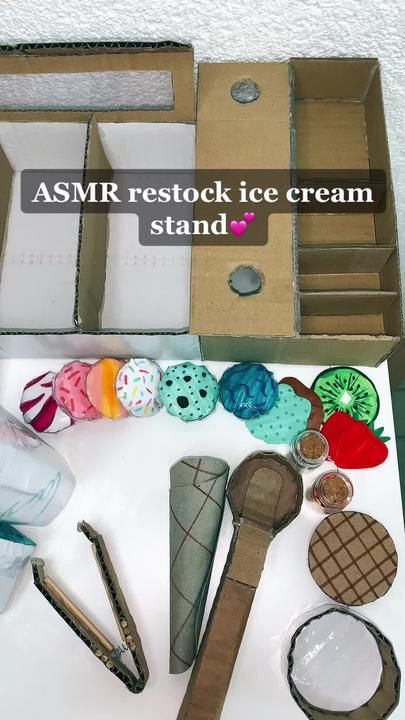 an assortment of ice creams and other items in a box with the words asmr restock ice cream stand