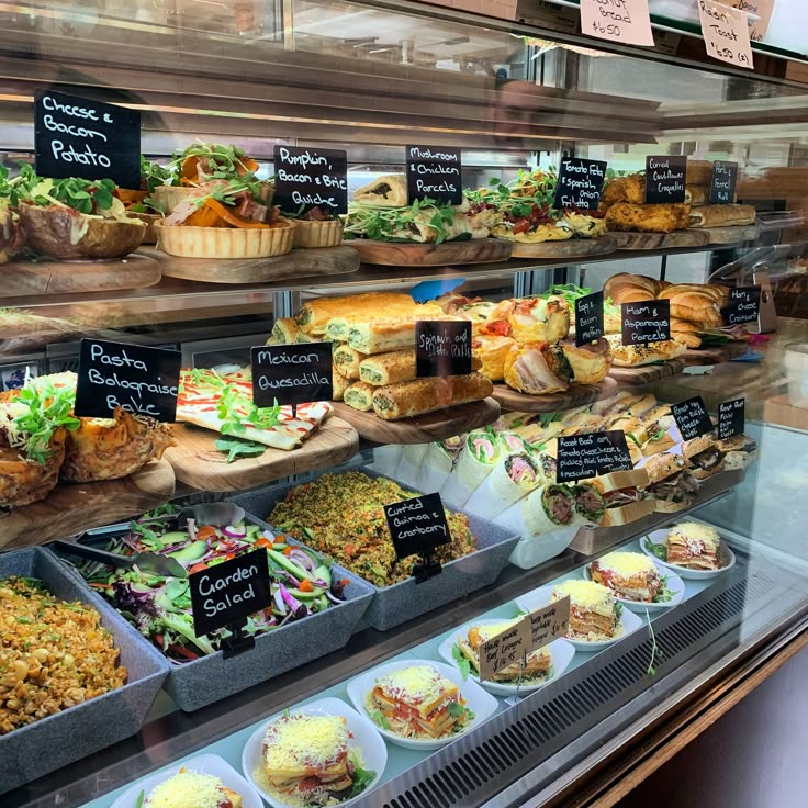 a display case filled with lots of different types of food