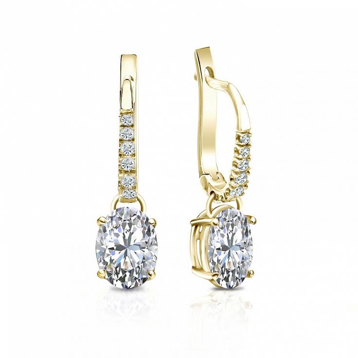 Dangle studs 4-prong basket set diamond earrings make an elegant statement for any occasion. These 14k yellow gold earrings can last a lifetime. The earrings feature oval-cut natural diamonds with 1.50 ct. total weight for center stone and with 0.10 ct. total weight of small dazzling round-cut diamonds as side stone totaling to 1.60 ct. in a complete pair, available in lever back clasps. Black Diamond Pendant, Black Diamond Studs, Halo Diamond Earrings, Solitaire Diamond Pendant, Colored Diamond Rings, Basket Setting, Basket Set, Black Diamond Ring, Gemstone Studs