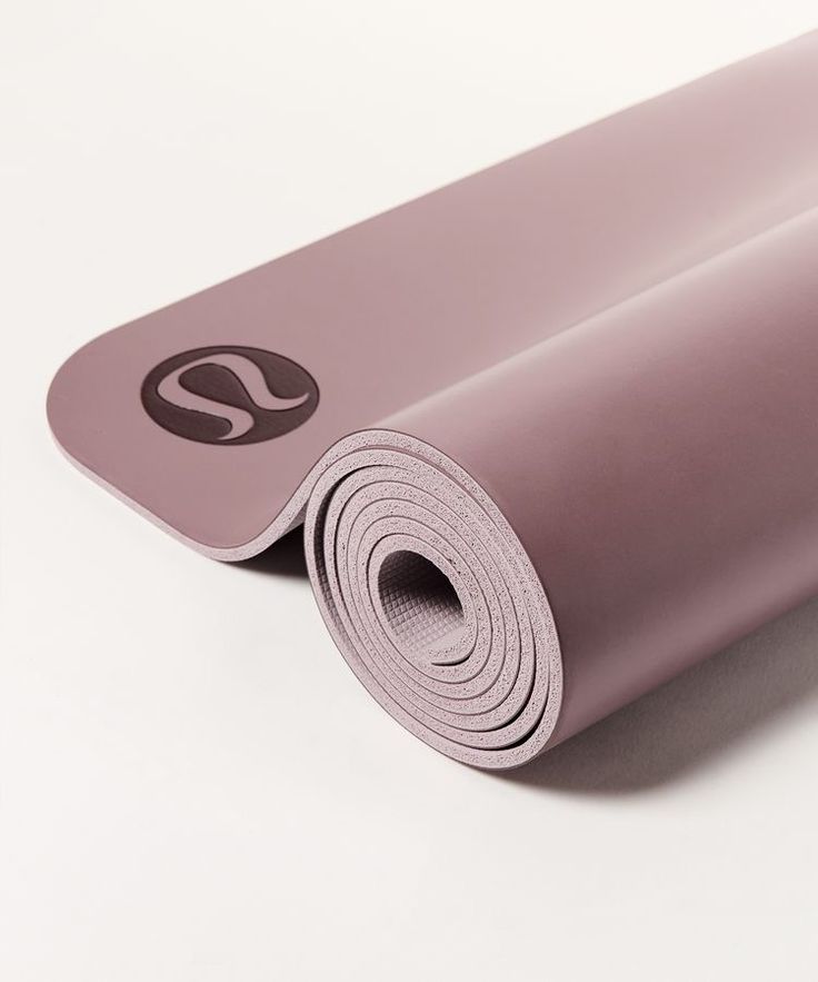 the yoga mat is rolled up and ready to be used as a mat for exercise