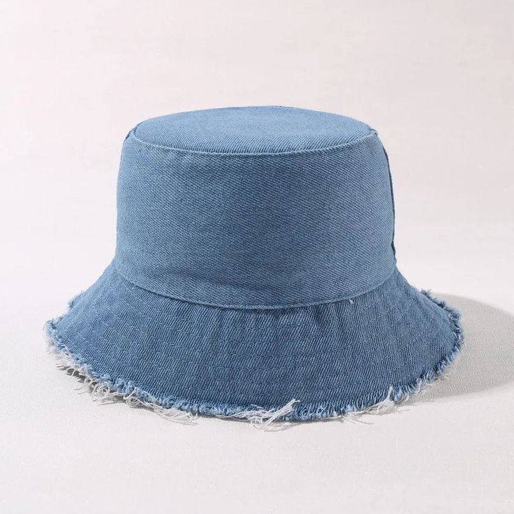 This fun and stylish Denim Kids Bucket hat is a great hat to protect your child's face & head from the hot sun and can be used in the rain too! It's suitable for ages 1-4 years old. Its simply adorable and practical! Hand wash Cheap Bucket Sun Hat One Size, Adjustable Blue Bucket Hat, Blue Denim Bucket Hat For Summer, Summer Denim Blue Cotton Hat, Blue Washed Bucket Hat, Denim Bucket Hat For Summer, Blue Denim Sun Hat With Curved Brim, Denim Blue Cotton Bucket Hat With Curved Brim, Medium Wash Cotton Bucket Hat With Wide Brim