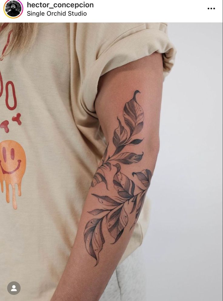 a person with a tattoo on their arm