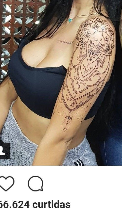 a woman with a tattoo on her arm