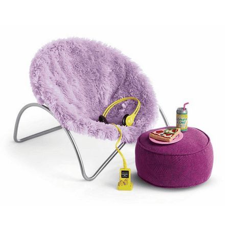 a purple chair sitting next to a foot stool with a yellow cord on the seat