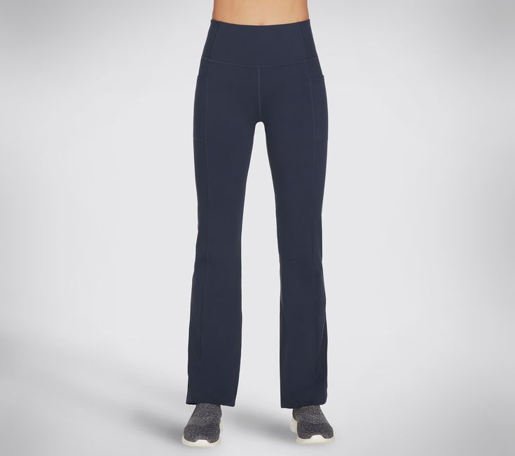 Designed for active performance with our signature comfort the Skechers GO WALK Wear Evolution II Flare Pant offers stylish versatility in a flattering fit. This high-waisted active pant features a GOFLEX moisture-wicking nylon and spandex blend fabric, flattering V-back waistband, chafe-free seams for total comfort, flare hem, exterior side pockets and back pockets. | Skechers Women's GO WALK Evolution II Flare Pant Skechers Go Walk, Flare Pant, Navy Fashion, Skechers Women, Personal Marketing, Flare Pants, Bottoms Pants, Fashion Pants, New Product