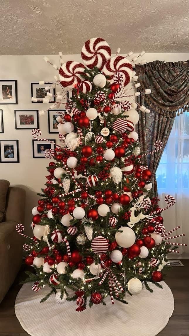 a christmas tree decorated with candy canes and ornaments