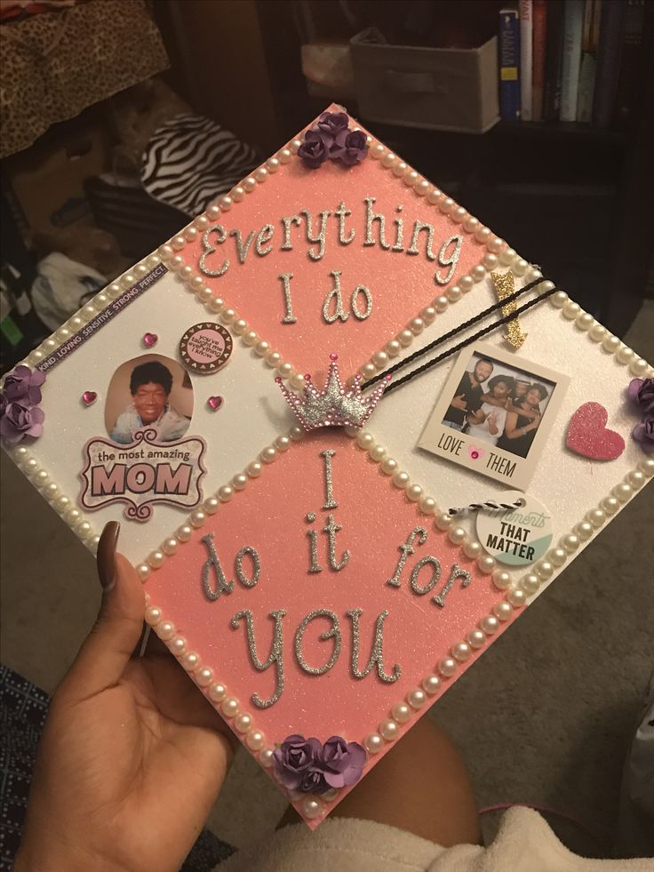 someone is holding up a pink graduation cap with pictures and writing on it that says, everything i do