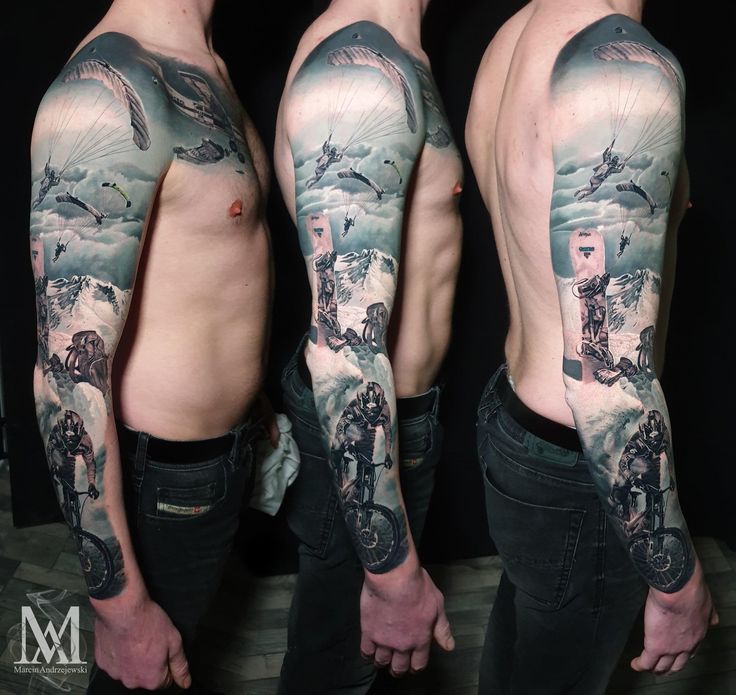 two men with full sleeve tattoos on their arms