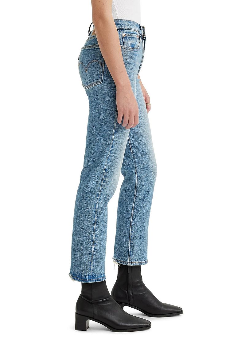 Inspired by cheeky vintage Levi's styles, these low-stretch jeans in a sanded medium wash hug the hips to showcase your curves to greatest effect. Distressed hems add lived-in character to the casual look. 15" leg opening; 11" front rise; 14 1/2" back rise (size 29 x 28) Button fly 99% cotton, 1% elastane Machine wash, tumble dry Imported Levi's Mid-rise Medium Wash Jeans, Levi's Straight Leg Cropped Jeans In Medium Wash, Levi's Mid-rise Cropped Jeans In Medium Wash, Fitted Cutoff Faded Jeans, Fitted Faded Cutoff Jeans, Levi's Medium Wash Jeans With Frayed Hem, Levi's Mid-rise Light Wash Jeans, Fitted Cutoff Rigid Denim Jeans, Spring Faded Jeans By Levi's