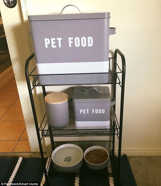 a pet food cart with two bowls on it