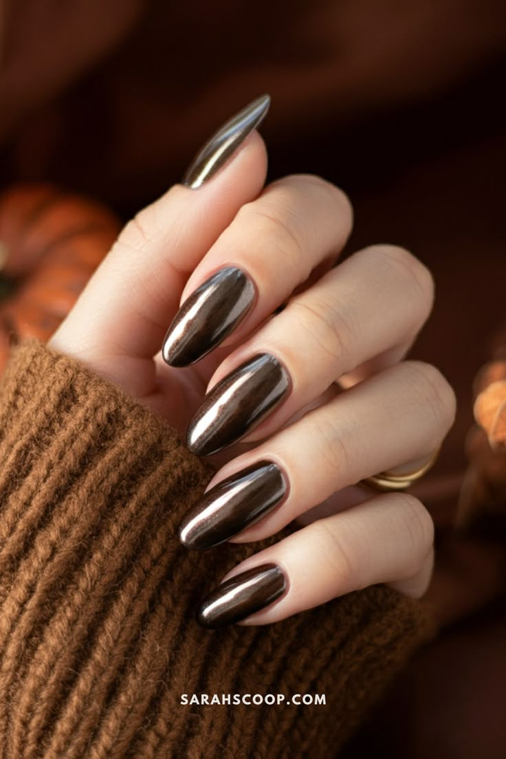 25 Best Fall Chrome Nails You Need to Try Fall Chrome Ombre Nails, November Nails Chrome, Chocolate Brown Nails With Chrome, Thanksgiving Chrome Nails, Dark Brown Chrome Nails, Brown Nails With Chrome, Fall Chrome Nail Colors, Chocolate Chrome Nails, Chrome Fall Nails