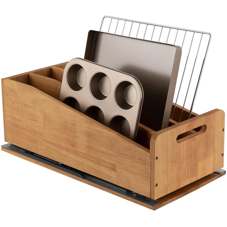 a wooden holder with three knives and two cutting boards in it