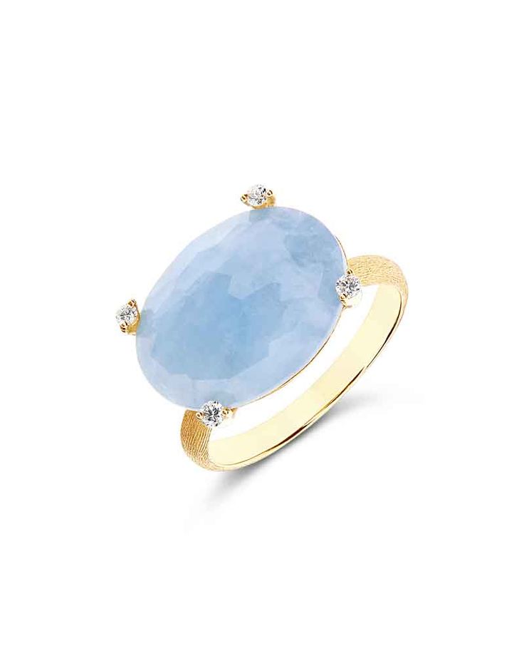 Simplicity and elegance come together in this 18kt gold, diamonds and aquamarine ring with an essential yet peculiar design, ode to the sea and the sky ... and to the infinite shades of blue. DIAMONDS: - Weight (total): 0.06 CT - Clarity: VS - Color: G - Cut: round Natural stones: - MILK AQUAMARINE Weight (total): 6.50 CT Luxury Light Blue Brilliant Cut Ring, Luxury Light Blue Ring With Brilliant Cut, Luxury Light Blue Round Rings, Luxury Light Blue Round Ring, Elegant Light Blue Aquamarine Diamond Ring, Luxury Light Blue Aquamarine Rings, Elegant Light Blue Brilliant Cut Ring, Luxury Blue Oval Moonstone Ring, Luxury Light Blue Rings With Accent Stones