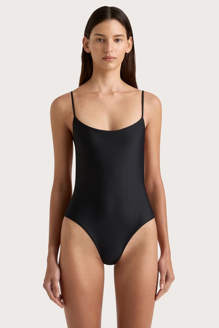 A classic one-piece with a rounded neckline that offers medium coverage and ample support across the bust. Featuring a backless bodice with adjustable tie detailing for a custom fit, wear on vacation or style as a foundational piece with a relaxed pair trousers and a button-up shirt. Faithfull The Brand, Black One Piece, Maxi Dress Sale, Swim Accessories, New Print, Swim Shorts, Custom Fit, Playsuit Jumpsuit, Button Up Shirts