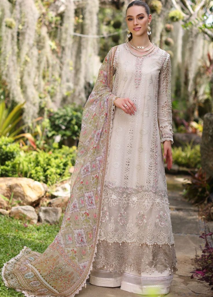 Brand: Saadia AsadProduct: Chikankari D-03BCollection: Noor by Saadia Asad Luxury Chikankari Lawn CollectionFabric: LawnDesign Work: Embroidered PRODUCT DETAILS: Schiffli and sequin embroidered lawn front Embroidered lawn back Embroidered lawn sleeves Dyed cambric trouser Digital printed chiffon dupatta Embroidered neckline & border Embroidered hem scalloped border Embroidered sleeves patch Embroidered Sleeves border & front batch Sequin Embroidered scalloped border DISCLAIMER:* Lining, Laces, a Pakistani White Dress, Designer Salwar Kameez, Kurta Dress, Designer Anarkali, Pakistani Salwar Kameez, Eid Dresses, Chiffon Collection, Pakistani Suits, Pakistani Designers