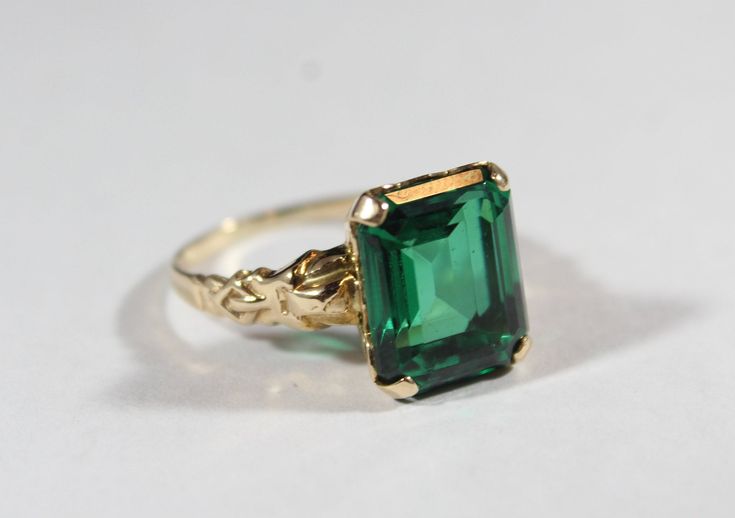 -Vintage 14k Gold Rectangular Cut Simulated Emerald Ring 7US -Ring size: 7 ~ 7.25 US -Simulated Emerald size: 12.2 mm x 9.9 mm -Total weight: 3.7 g -Marked 14k Timeless Rectangular Yellow Gold Emerald Ring, Formal Rectangular Emerald Ring With Center Stone, Fine Jewelry Emerald Ring With Rectangular Stone For Formal, Emerald Ring Vintage Gold, Classic Diamond Cut Ring With May Birthstone, Classic Diamond Cut Ring For May Birthstone, Timeless Rectangular Emerald Ring In Yellow Gold, Gold Emerald Rectangular Ring Timeless Style, Classic Emerald Signet Ring For Wedding